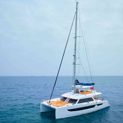 Seaview 59 electric catamaran under solar panels showcasing clean-energy yacht design