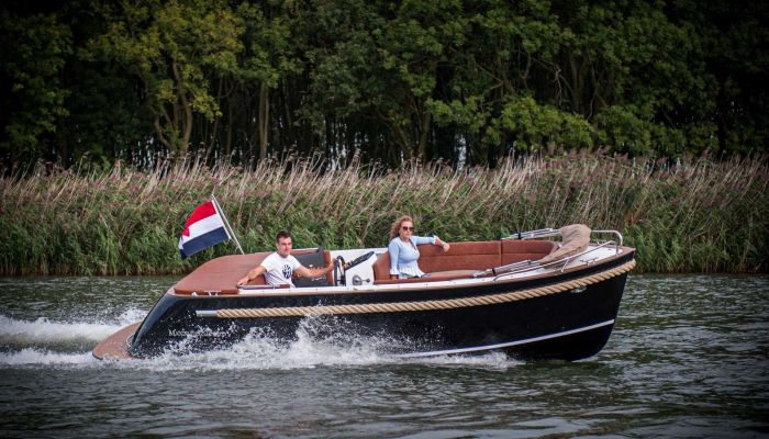 Maxima 620 electric sloop tender with rope fender and swim platform